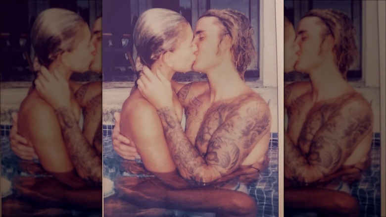 Justin Bieber and Hailey Bieber kissing in a pool