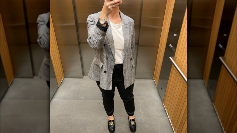 Woman wearing a blazer and loafers
