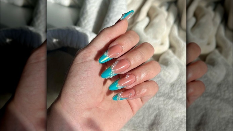 Turquoise tipped nails with pearls