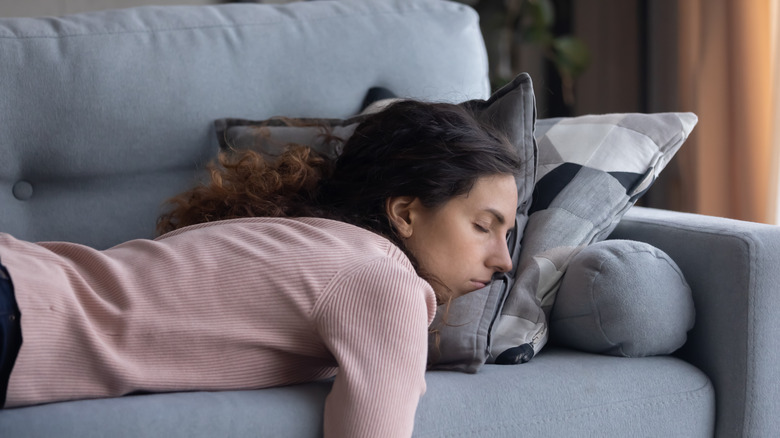 Woman sleeping on the couch