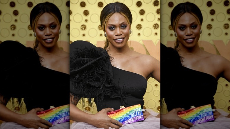 Laverne Cox with trans rights clutch