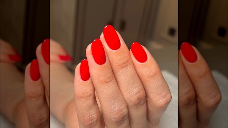 Glossy red manicure