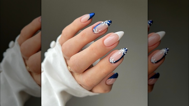 Royal blue snowflake manicure