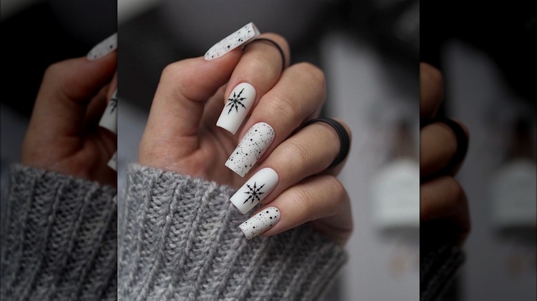 White and black snowflake nails