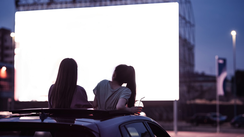 Two women at the drive in