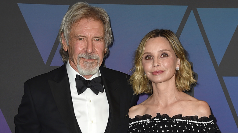 Calista Flockhart posing with Harrison Ford