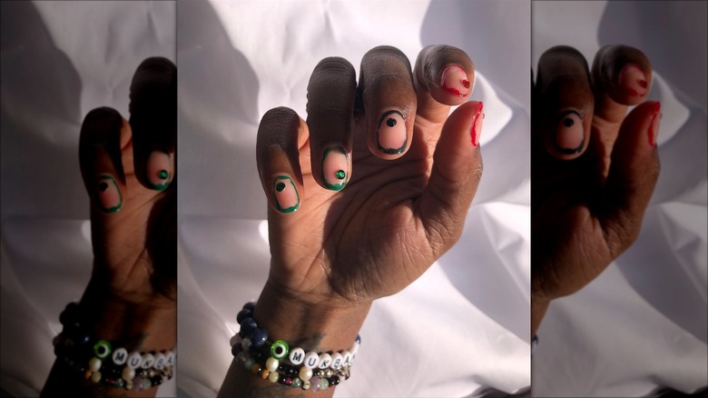 Kwanzaa-inspired rhinestone nails