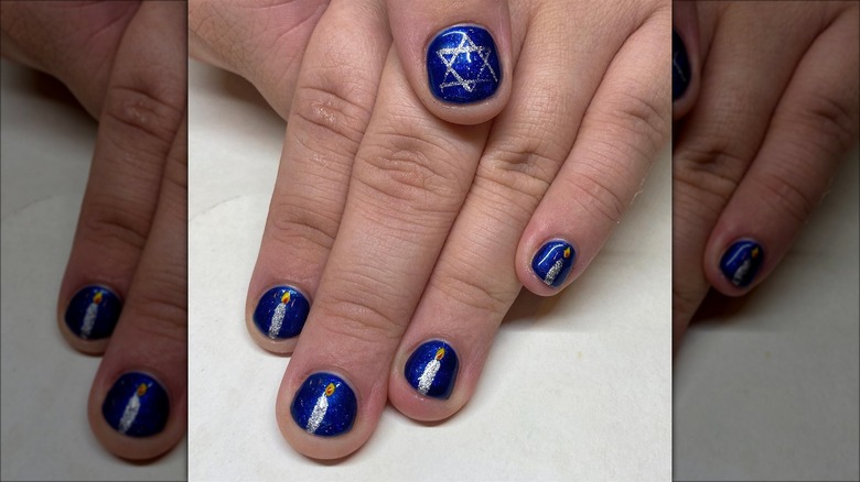 Blue nails with Hanukkah candles and Star of David