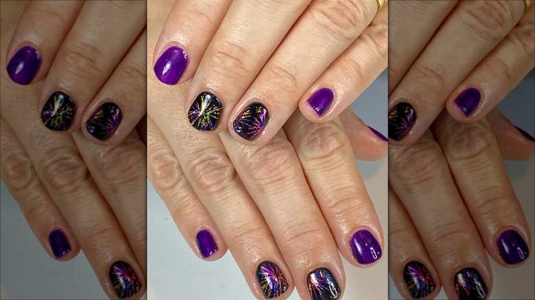 Black manicure with holographic foil fireworks