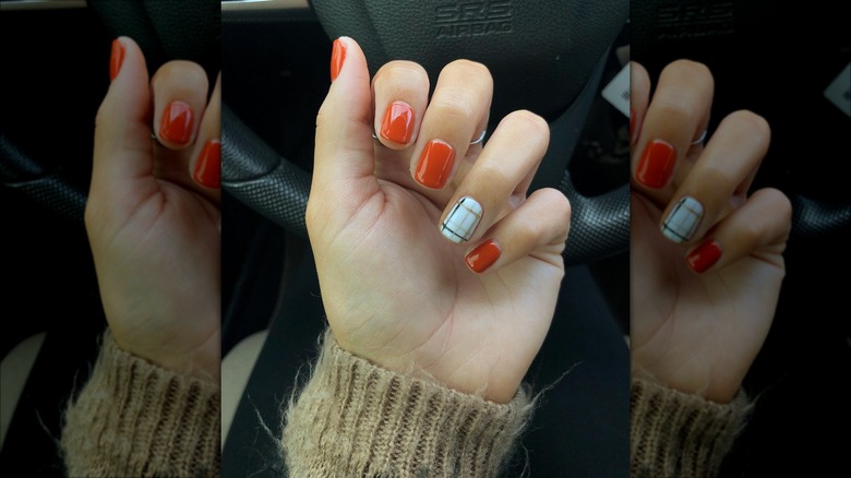 Burnt orange manicure with plaid accent nail for Thanksgiving