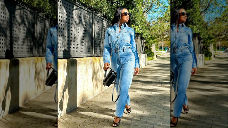 Woman in denim jumpsuit