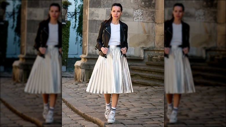 Woman in a silver skirt