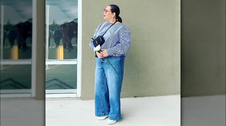 A woman wearing jeans