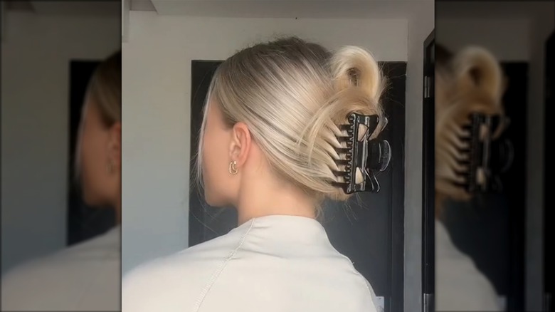 Woman with a black claw clip