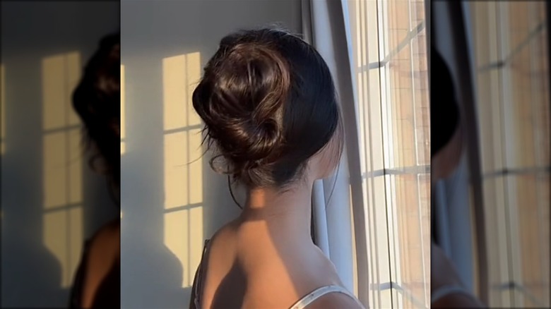 Woman with a claw clip updo