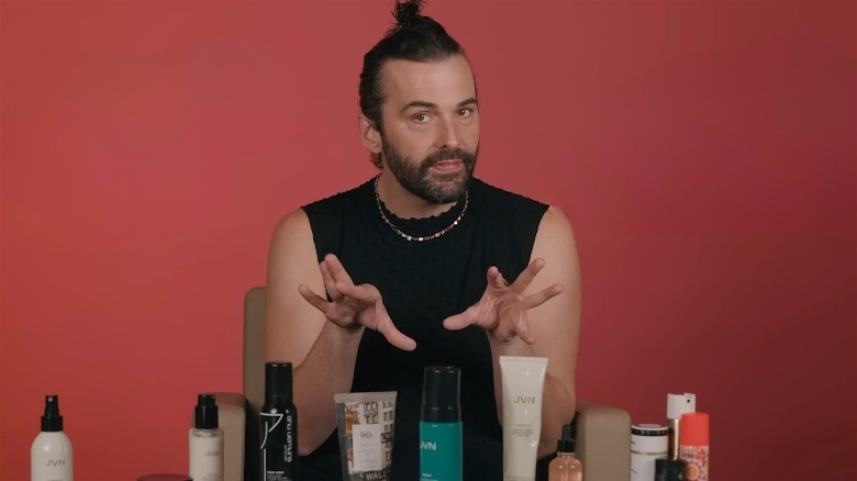 Jonathan Van Ness with his haircare products