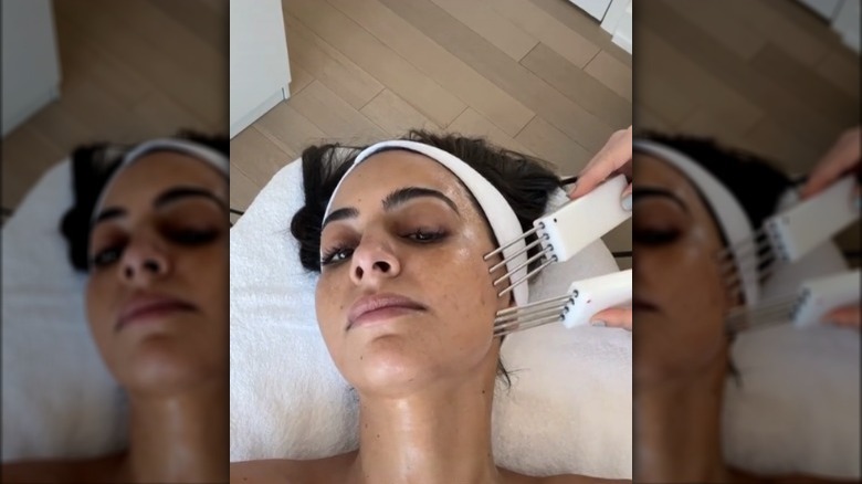 Woman getting a microcurrent facial
