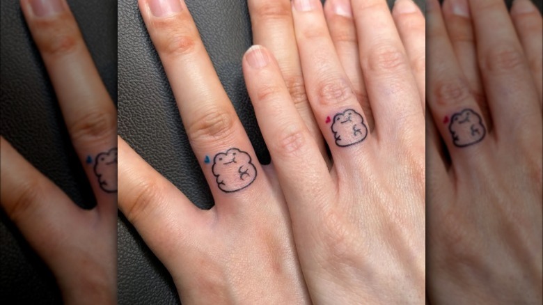Matching ring finger tattoos