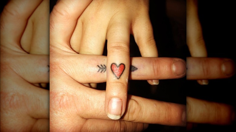 Heart and arrow tattoos
