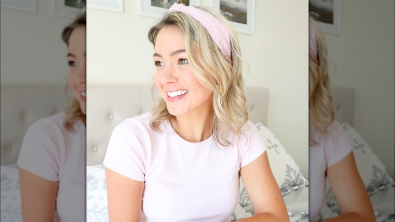 Woman in a pink gingham headband