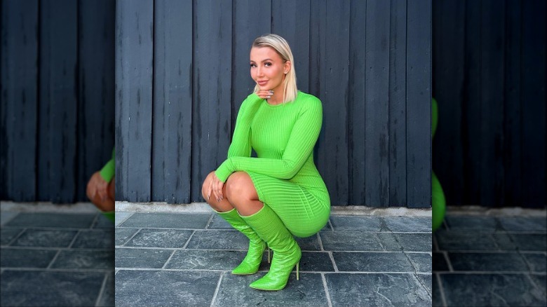 Bright green dress and boots