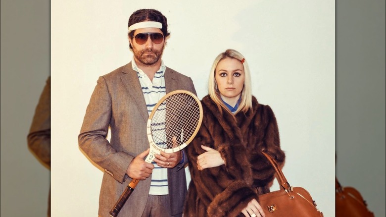 man and woman dressed in Royal Tenenbaums costume