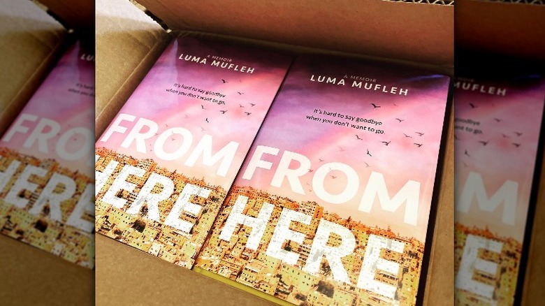 Box opened with "From Here" books inside