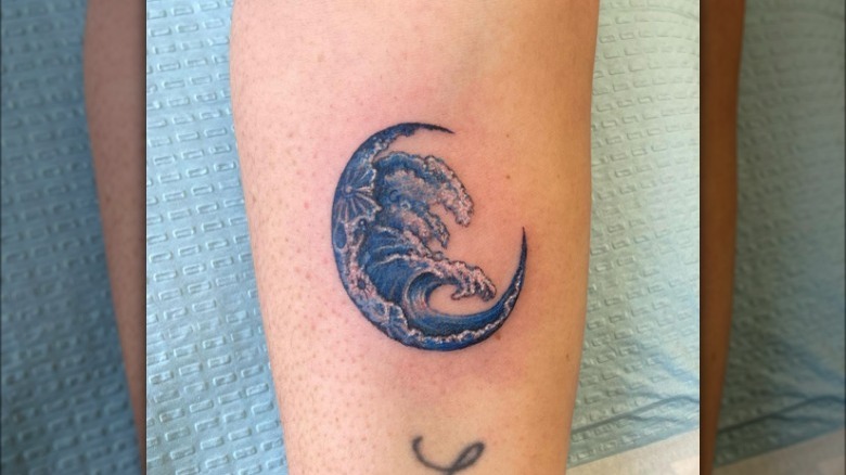 Moon and waves tattoo