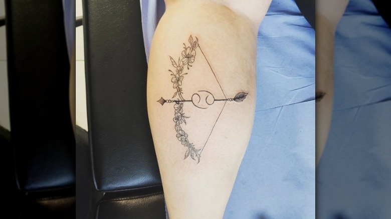 Cancer arrow tattoo