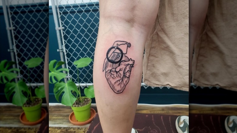Heart grenade tattoo