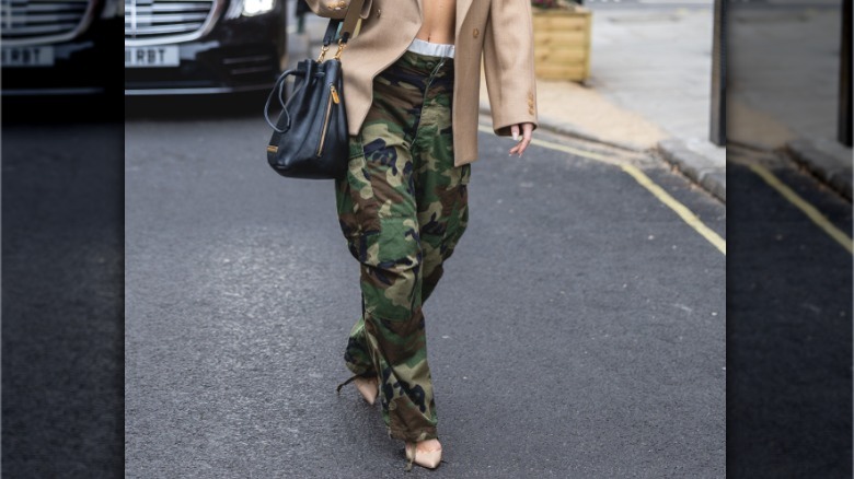camo trousers and heels
