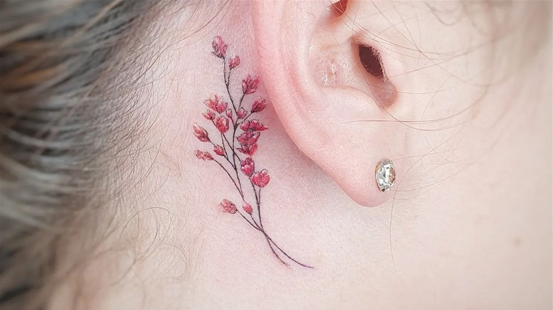 Flower ear tattoo