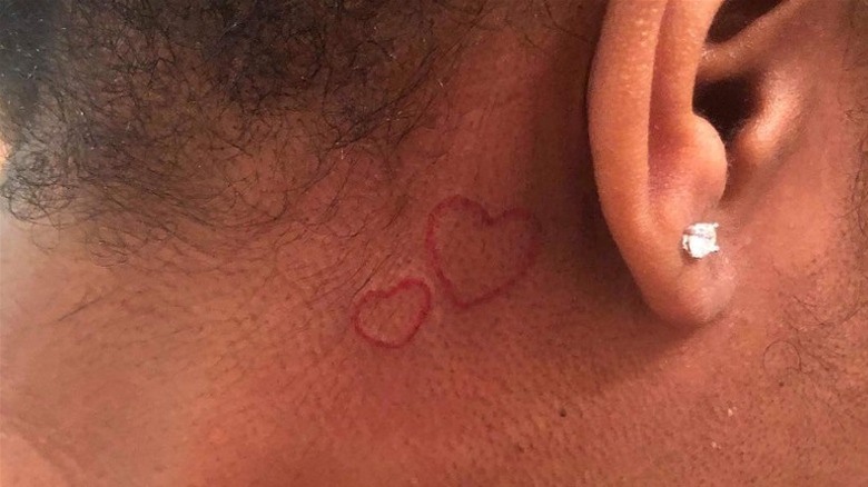 Heart behind the ear tattoos