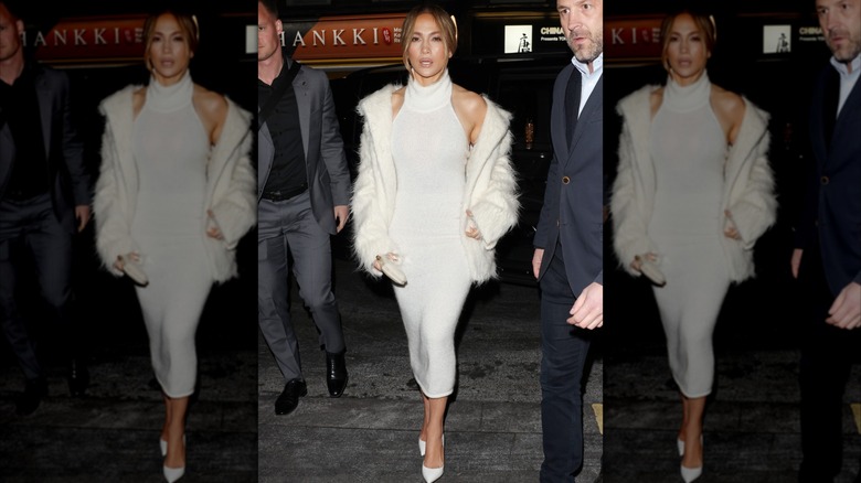 Jennifer Lopez in a white dress, white coat and white heels