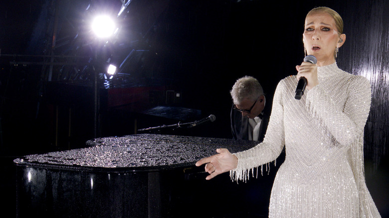 Celine Dion performing on the Eiffel Tower in Paris in honor of the Olympics