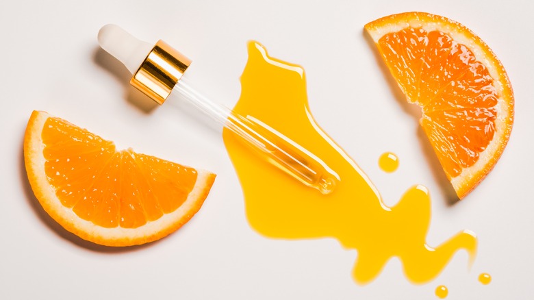 Vitamin C serum with orange slices 