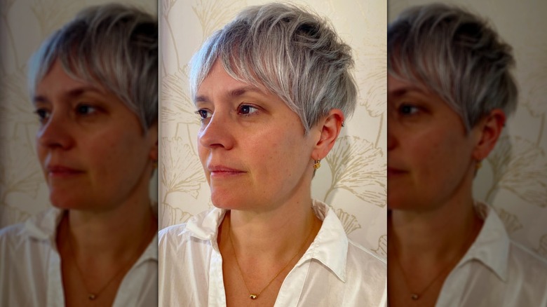 Woman with gray pixie cut