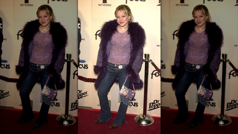 Hillary Duff on the red carpet in a purple fur-trimmed coat