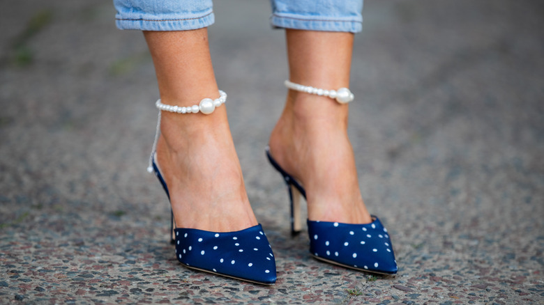 Woman wearing pearl anklets