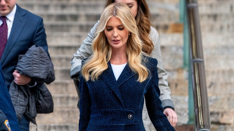 Ivanka Trump in a dark blue coat