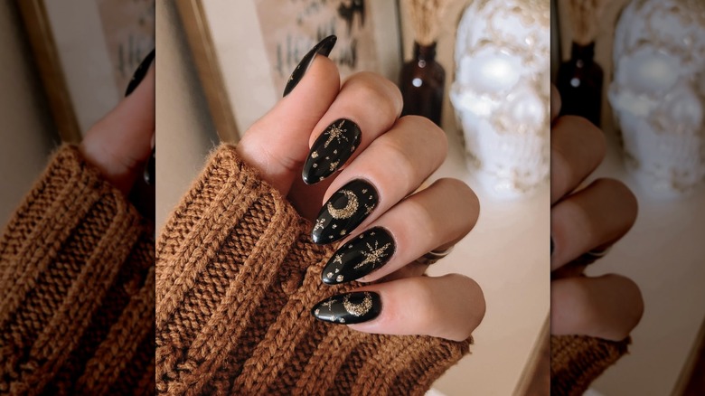 Black and gold nails