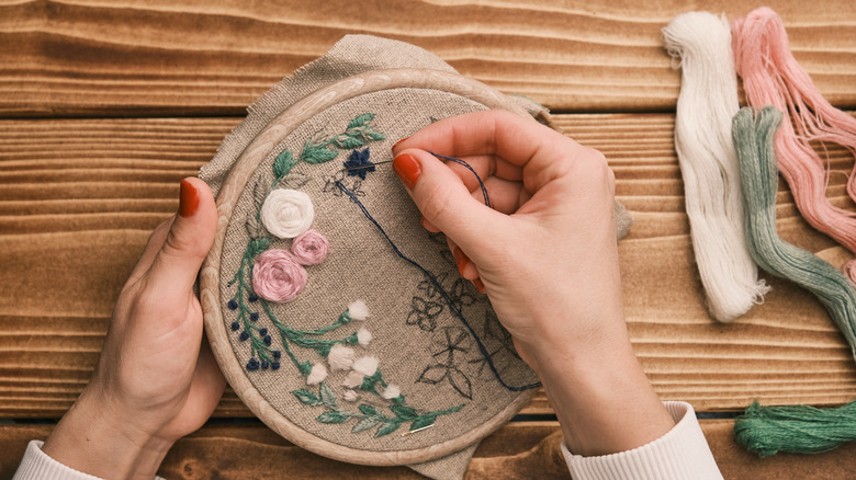 Woman embroidering 