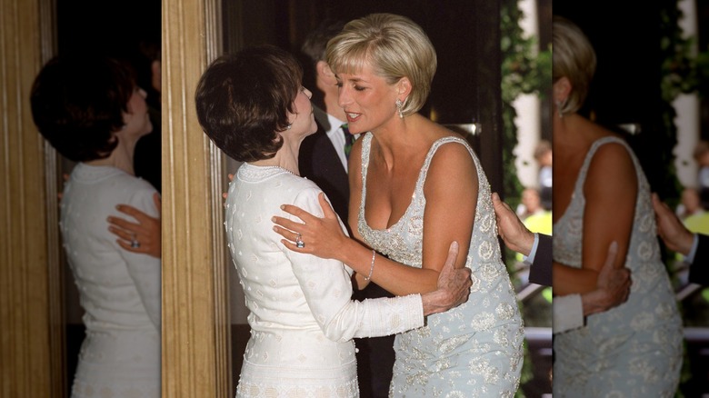 Diana, Princess of Wales, wears a diamond tennis bracelet at a Christie's event