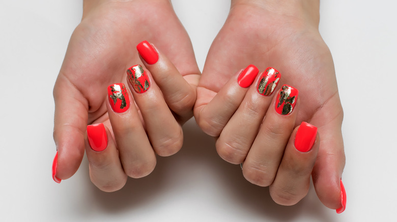 Red nails with gold foil