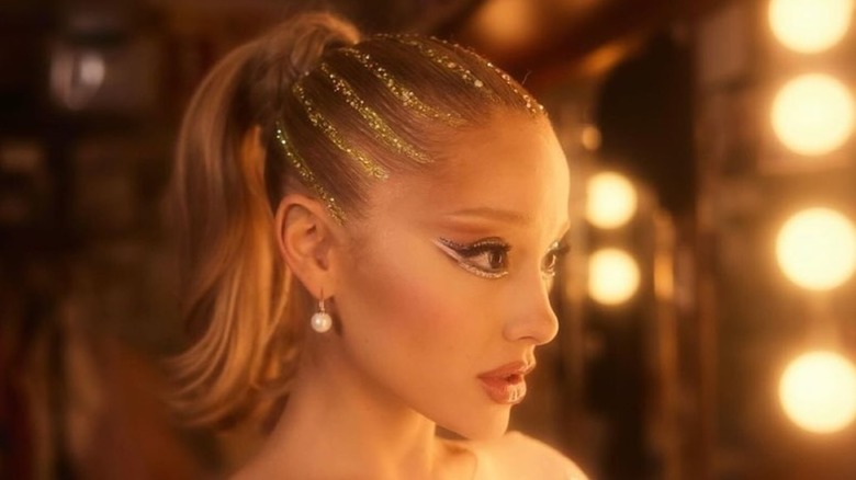 Ariana Grande dressed as Nomi Malone from "Showgirls"