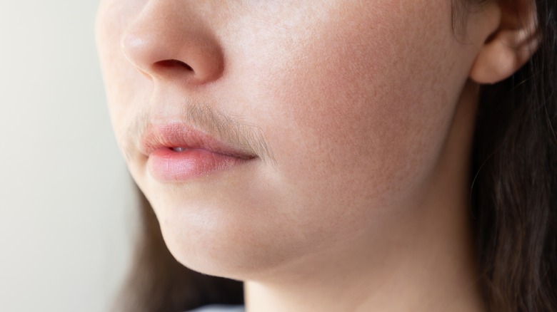 Woman with upper lip hair