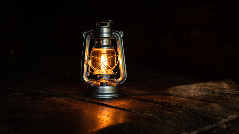 An oil lamp in the dark