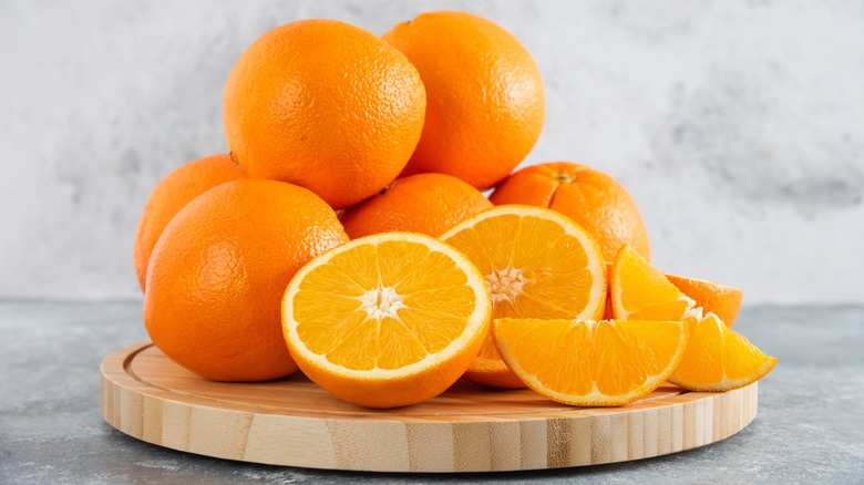 Oranges on a wooden board
