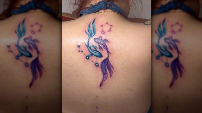 Fish and constellation tattoo