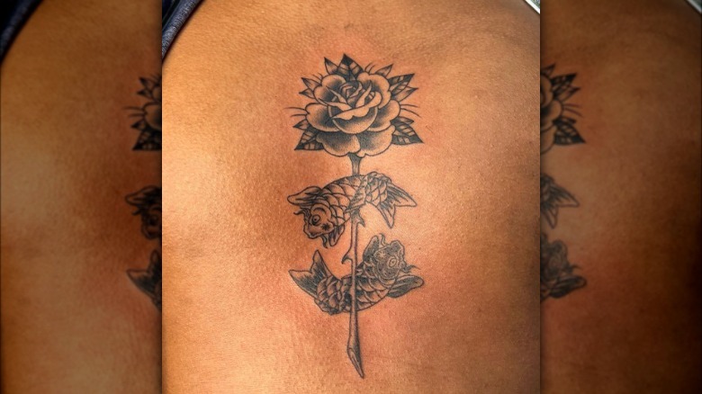 Pisces flower tattoo